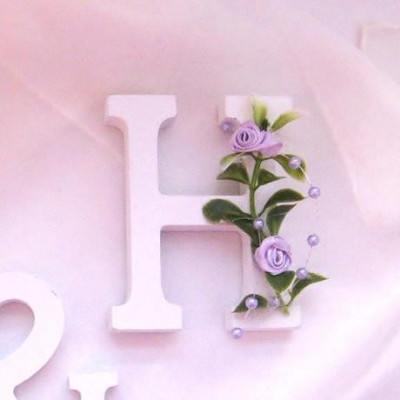 Písmena s růžičkami